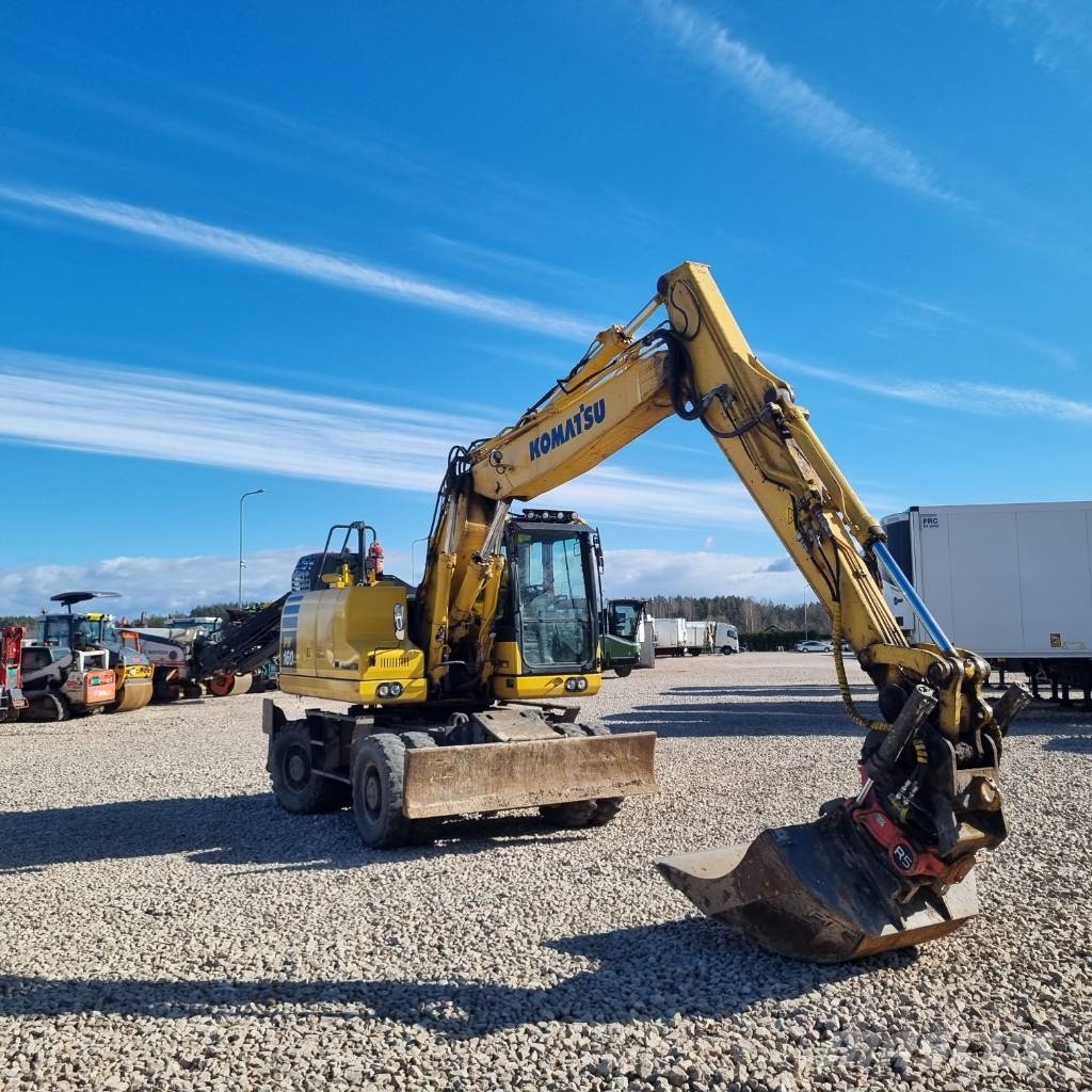Komatsu PW160 - 11 حفارات بعجل