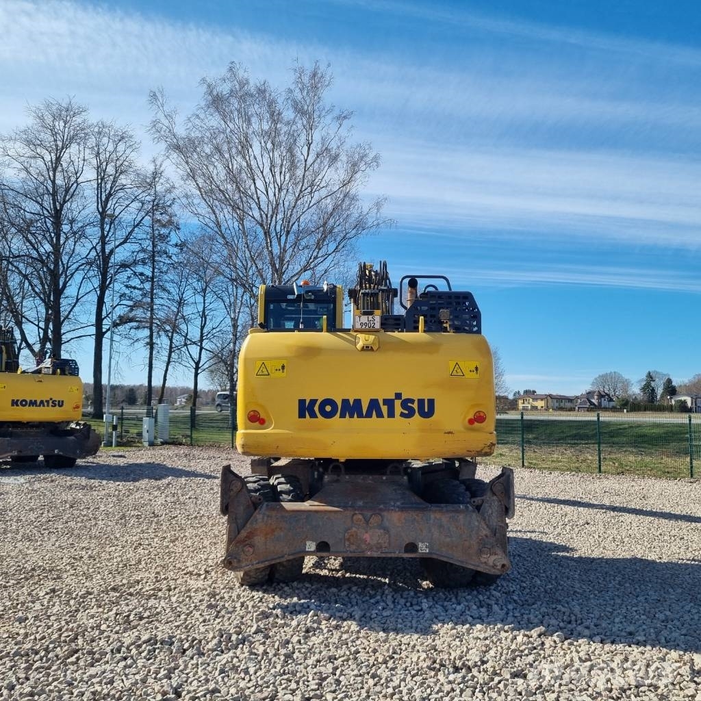 Komatsu PW160 - 11 حفارات بعجل