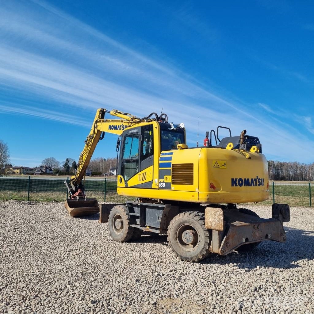 Komatsu PW160 - 11 حفارات بعجل