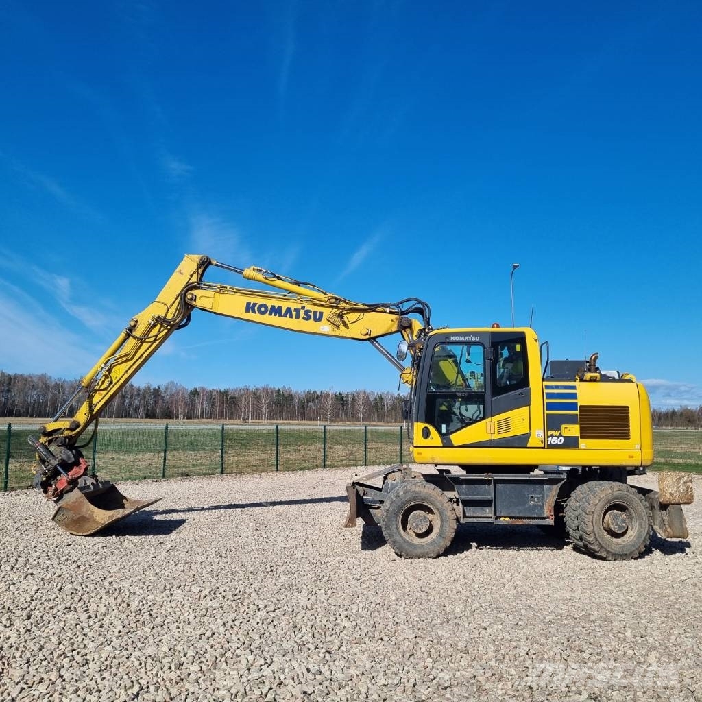 Komatsu PW160 - 11 حفارات بعجل