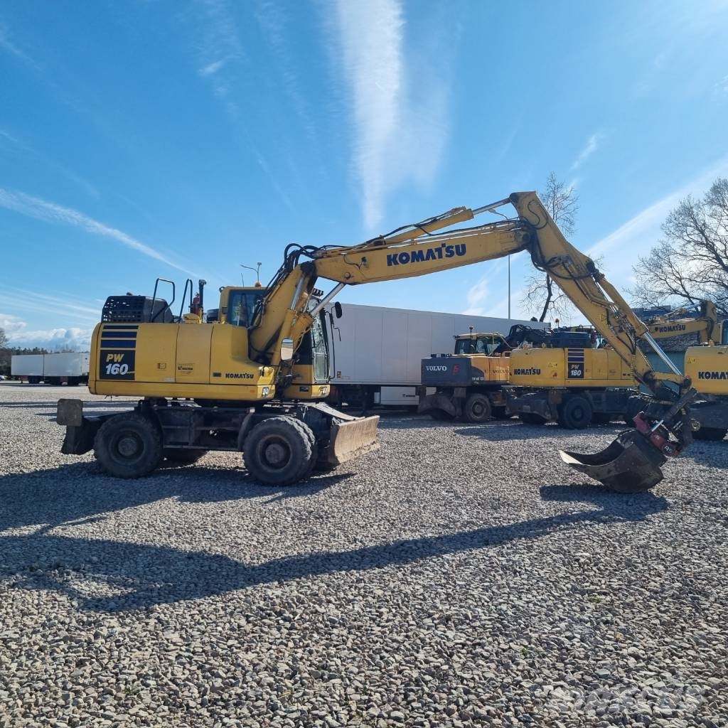 Komatsu PW160 - 11 حفارات بعجل
