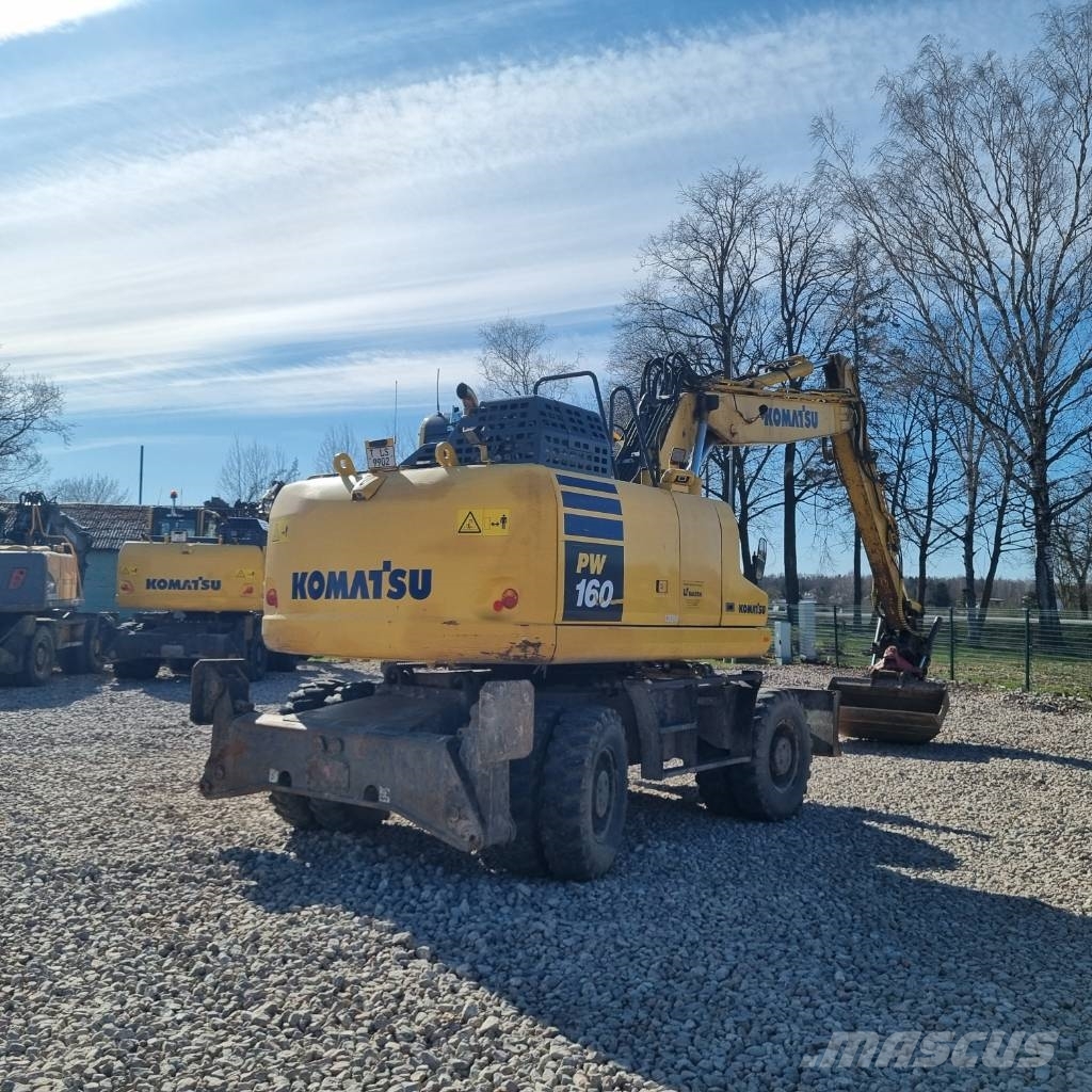 Komatsu PW160 - 11 حفارات بعجل