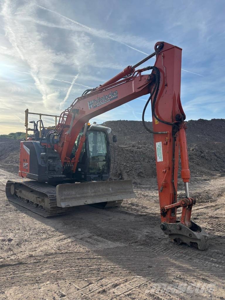 Hitachi ZX 135 US-7 حفارات زحافة