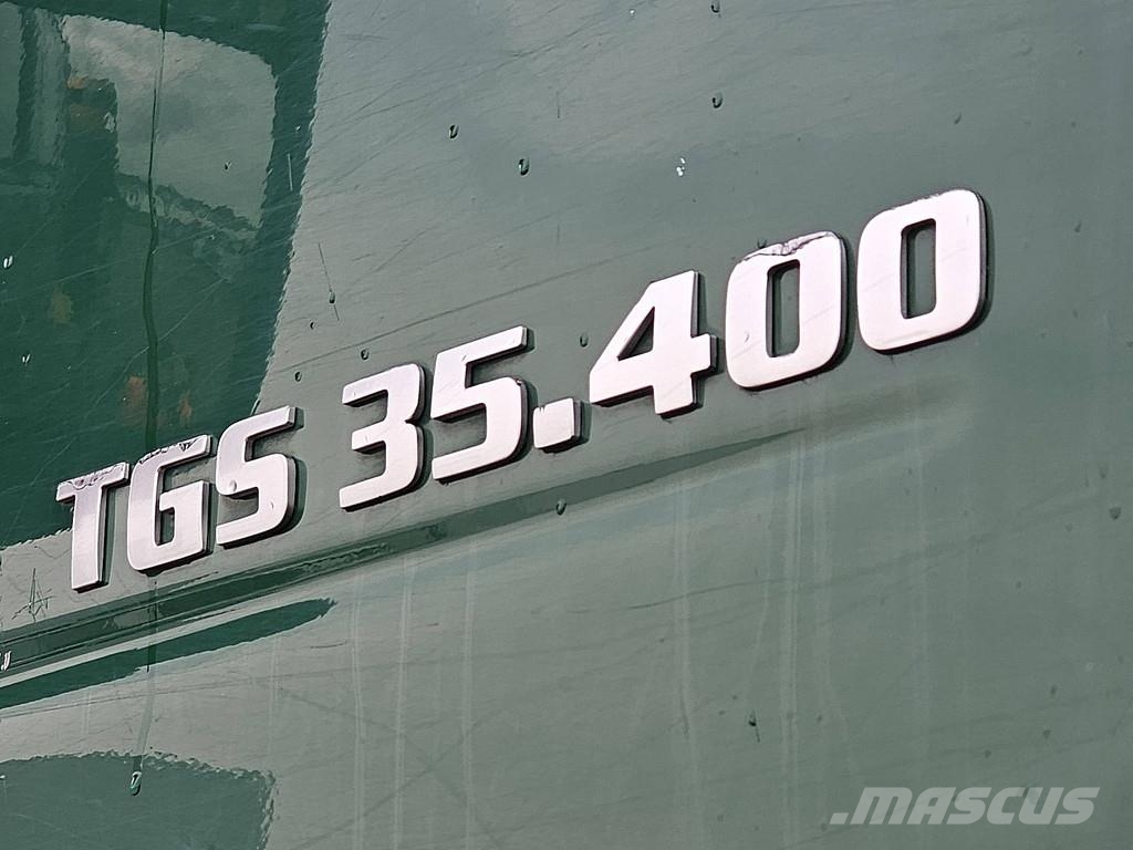MAN 35.400 TGS Schmitz Mulde 8x6 Lastbiler med tip
