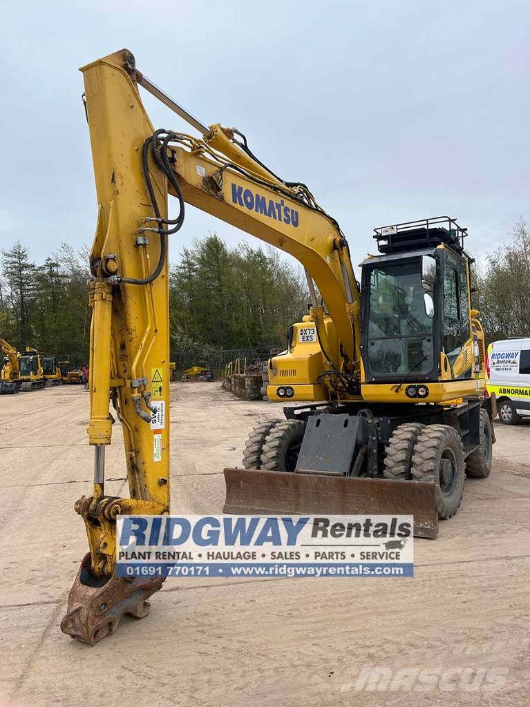 Komatsu PW 148-11 حفارات بعجل