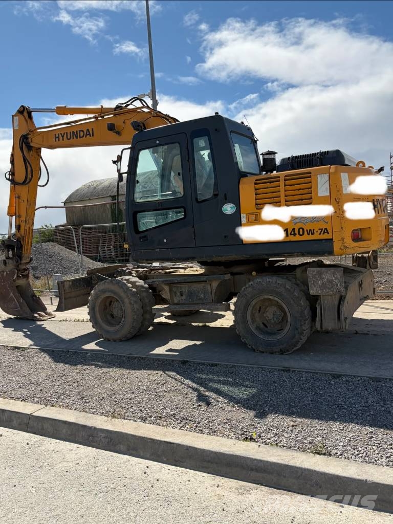 Hyundai 140w-7 حفارات بعجل