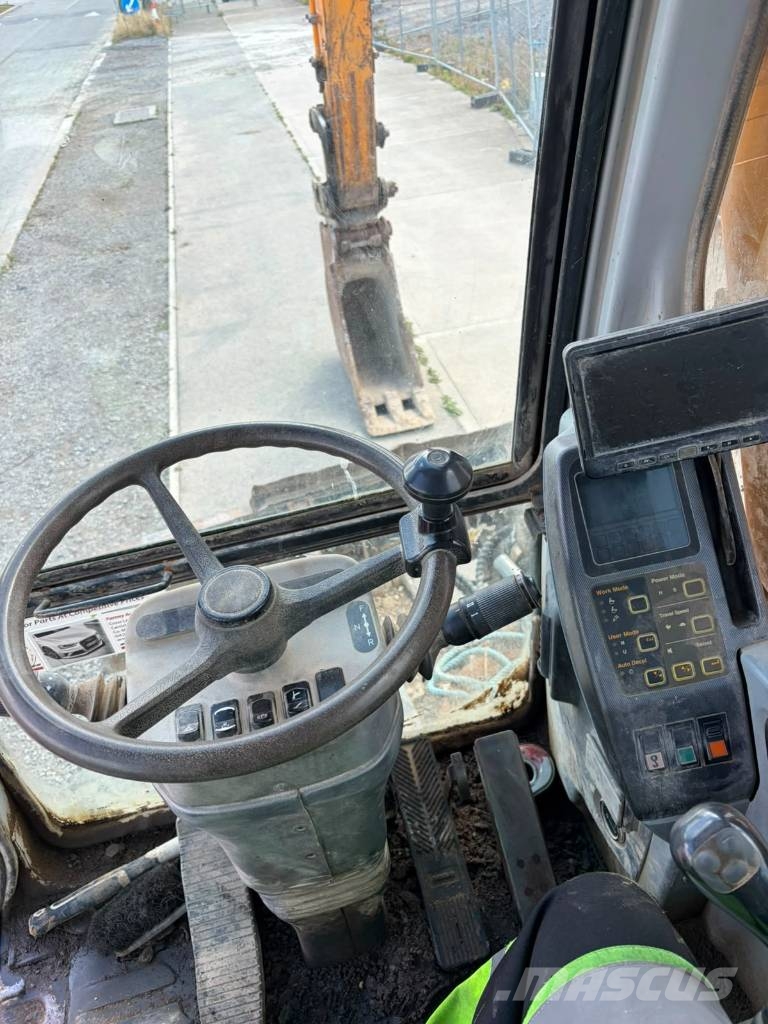 Hyundai 140w-7 حفارات بعجل