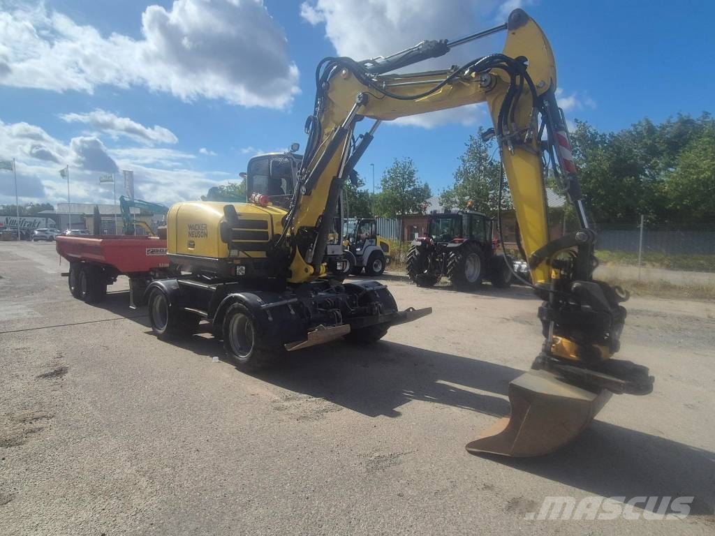 Wacker Neuson EW100 & Bigabkärra med 3 skopor Kolesové rýpadlá