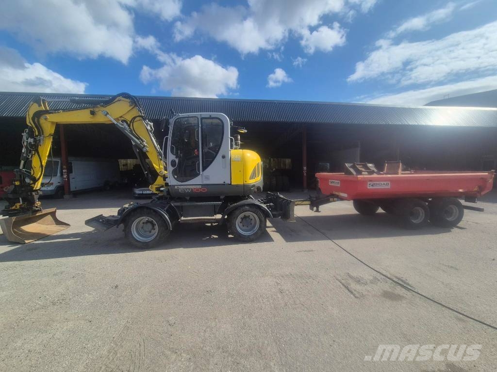 Wacker Neuson EW100 & Bigabkärra med 3 skopor Kolesové rýpadlá