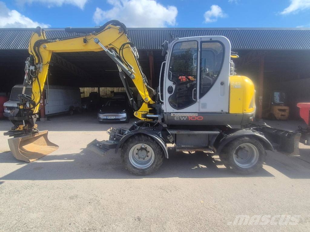 Wacker Neuson EW100 & Bigabkärra med 3 skopor Kolesové rýpadlá