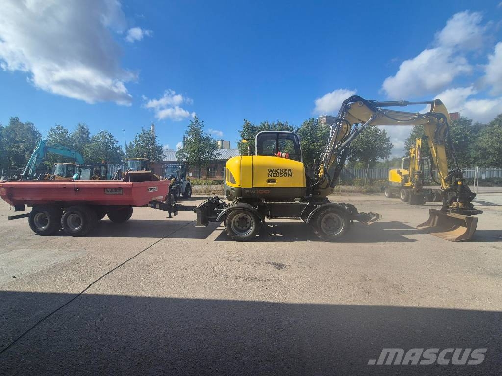 Wacker Neuson EW100 & Bigabkärra med 3 skopor Kolesové rýpadlá