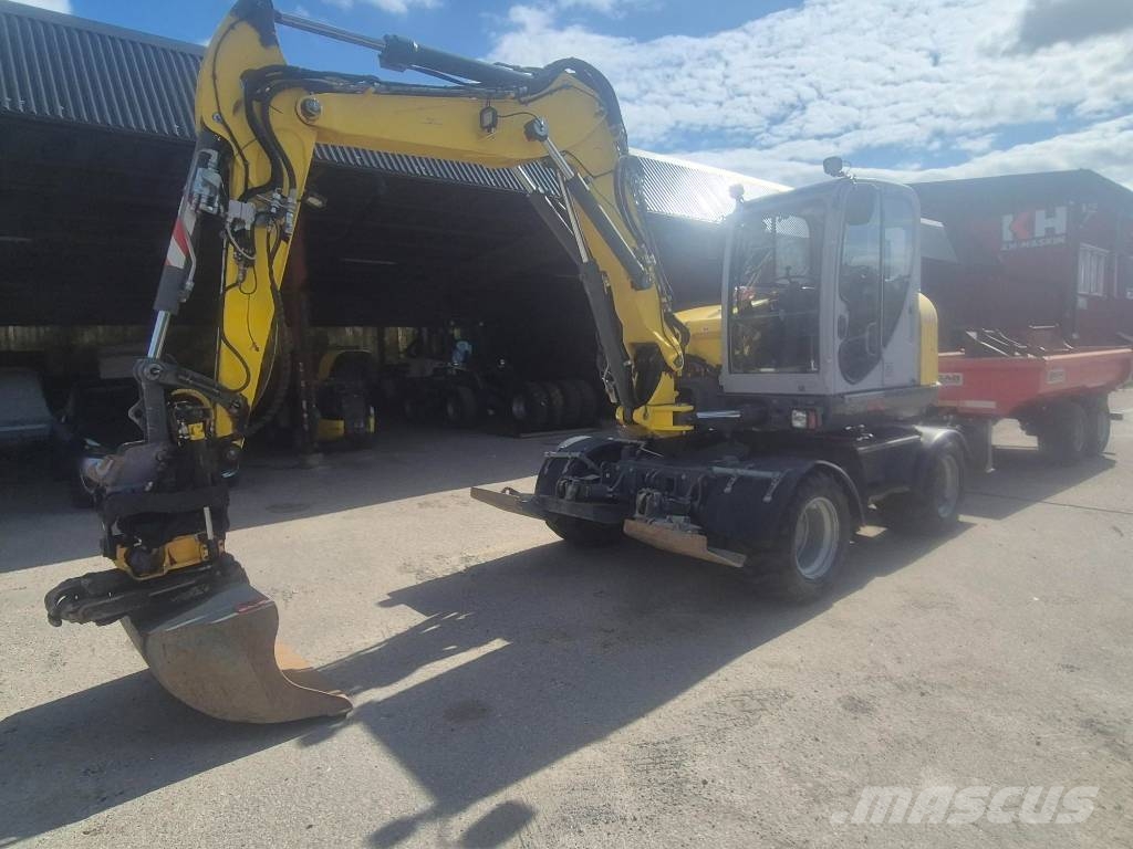 Wacker Neuson EW100 & Bigabkärra med 3 skopor Kolesové rýpadlá