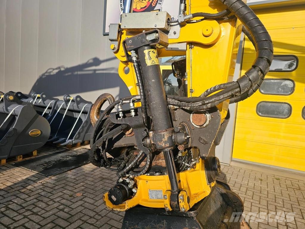 CAT M315F حفارات بعجل