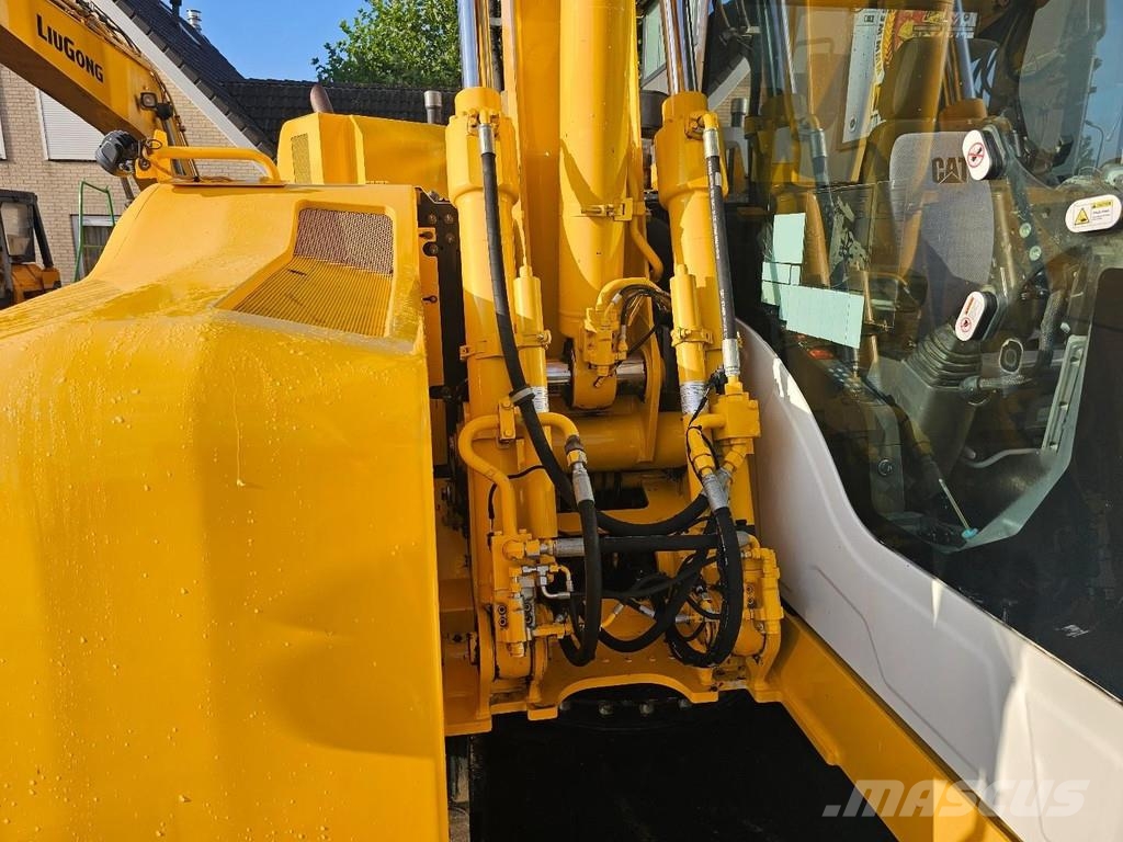 CAT M315F حفارات بعجل