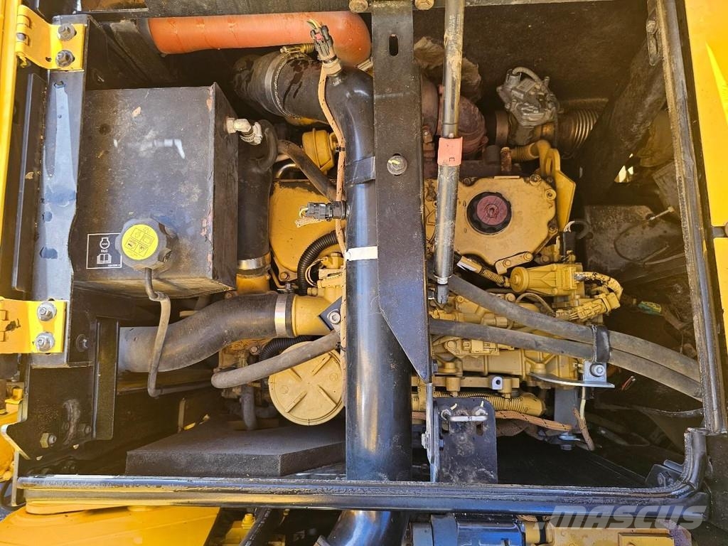 CAT M315F حفارات بعجل