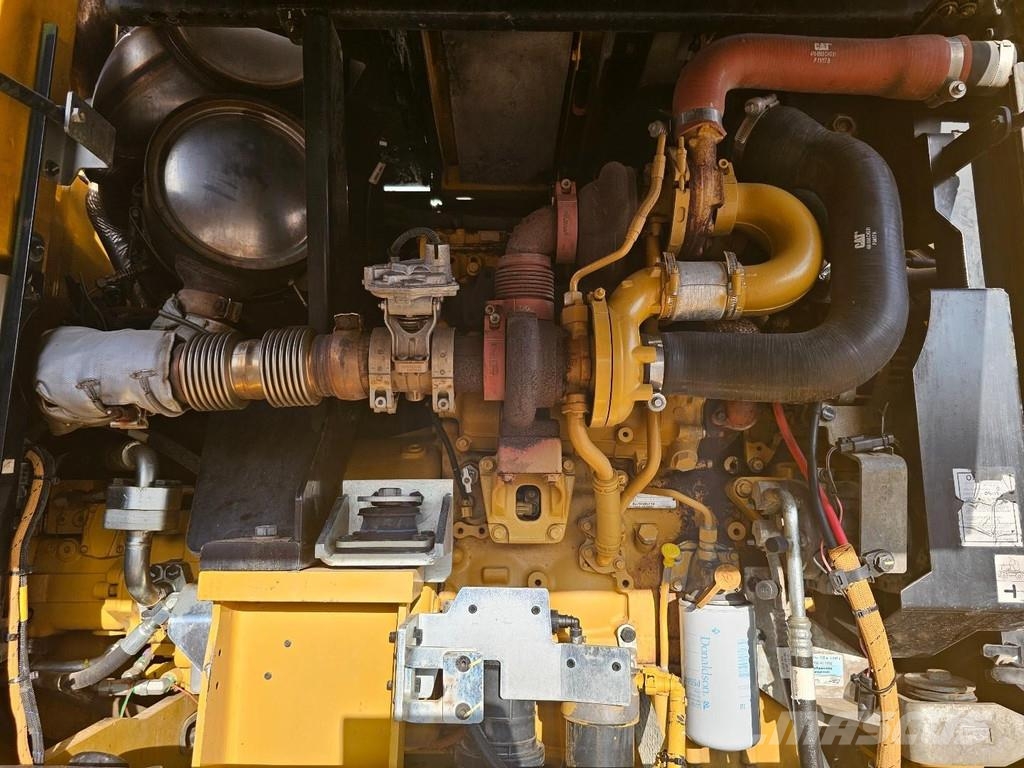 CAT M315F حفارات بعجل