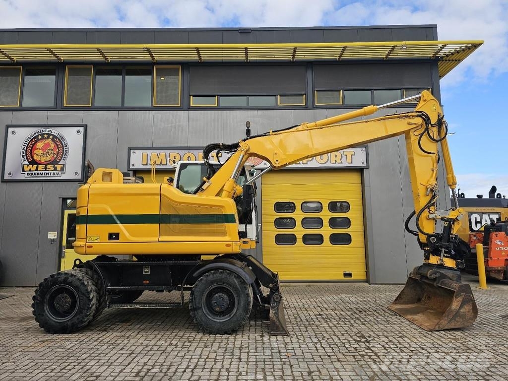 CAT M315F حفارات بعجل