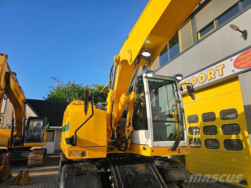 CAT M315F حفارات بعجل
