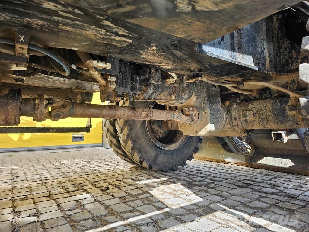 CAT M315F حفارات بعجل