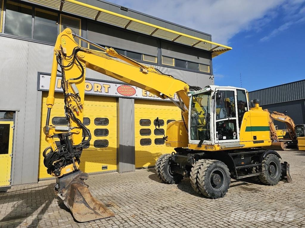 CAT M315F حفارات بعجل