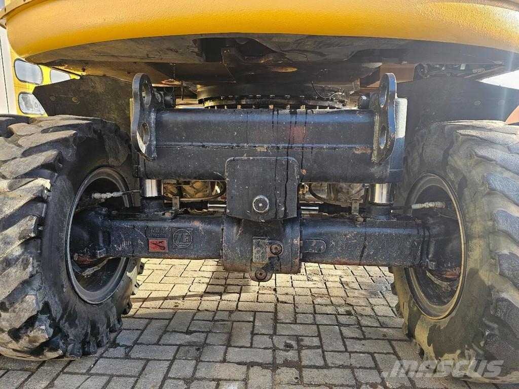 CAT M315F حفارات بعجل