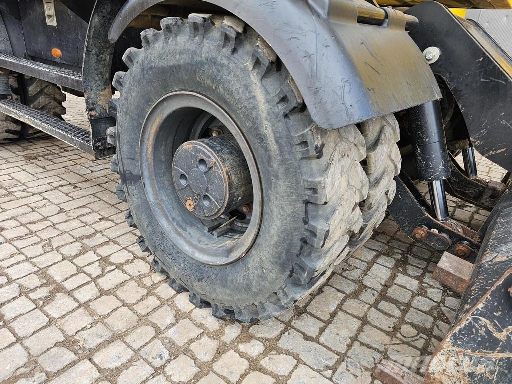 CAT M315F حفارات بعجل