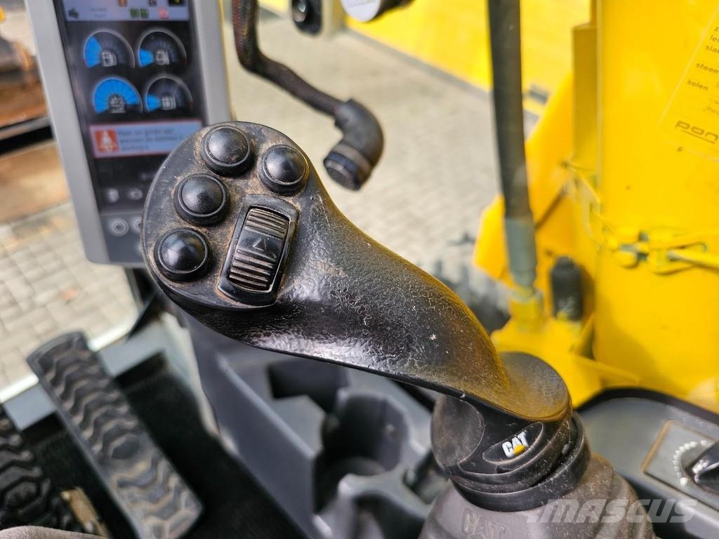 CAT M315F حفارات بعجل