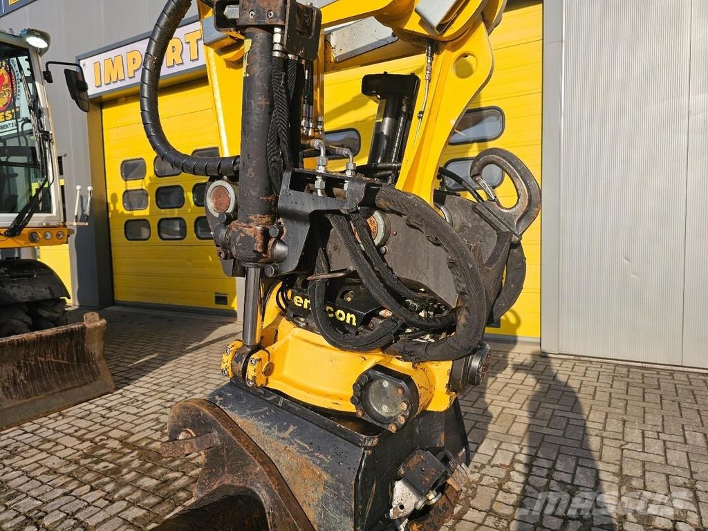 CAT M315F حفارات بعجل