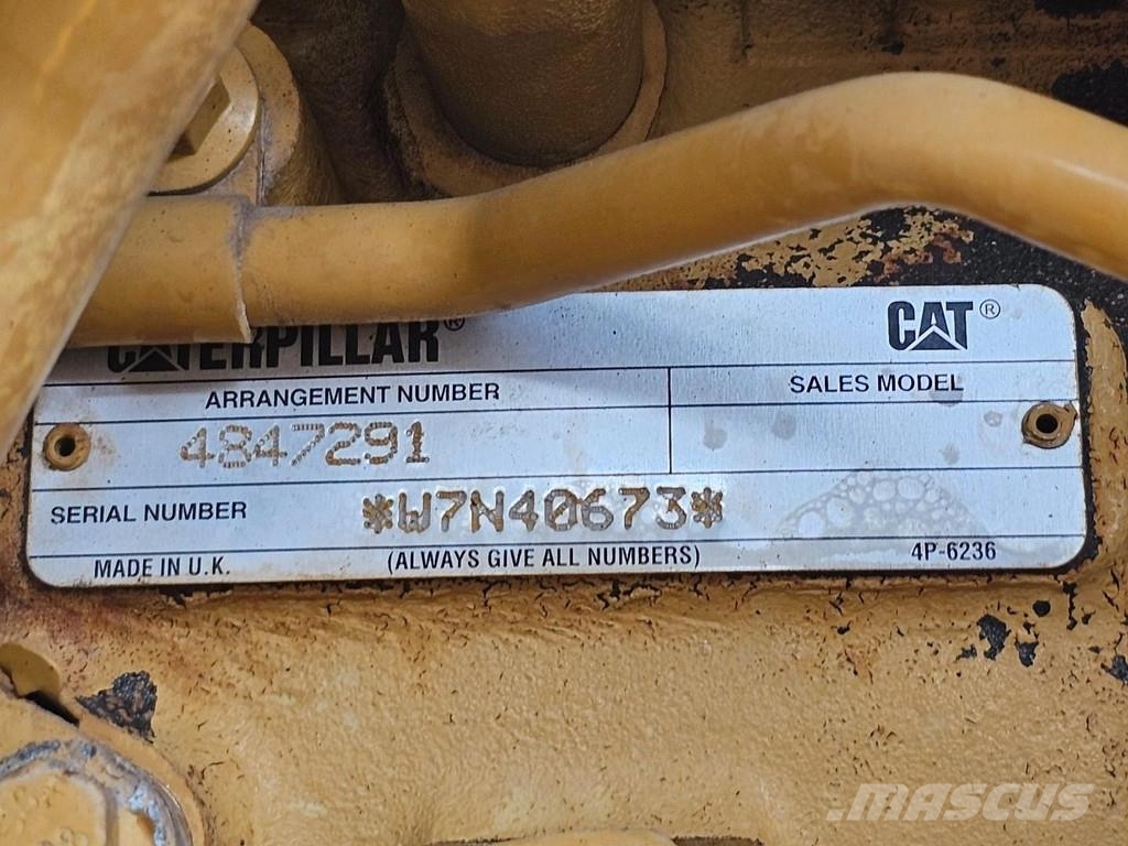 CAT M315F حفارات بعجل
