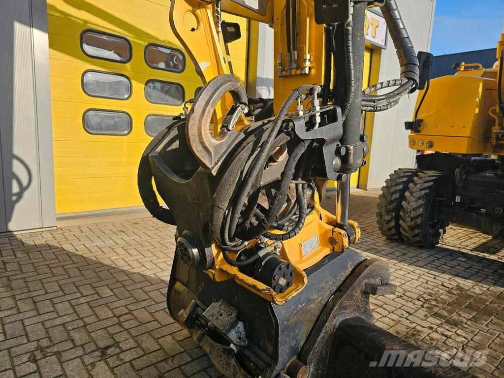 CAT M315F حفارات بعجل