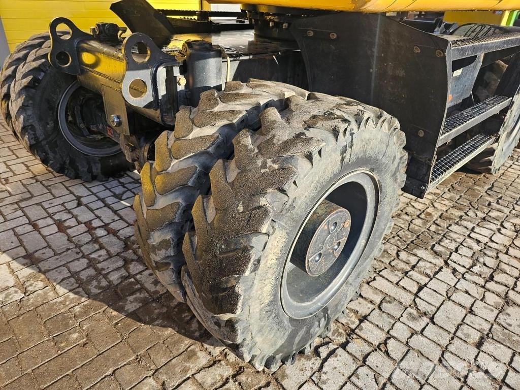 CAT M315F حفارات بعجل