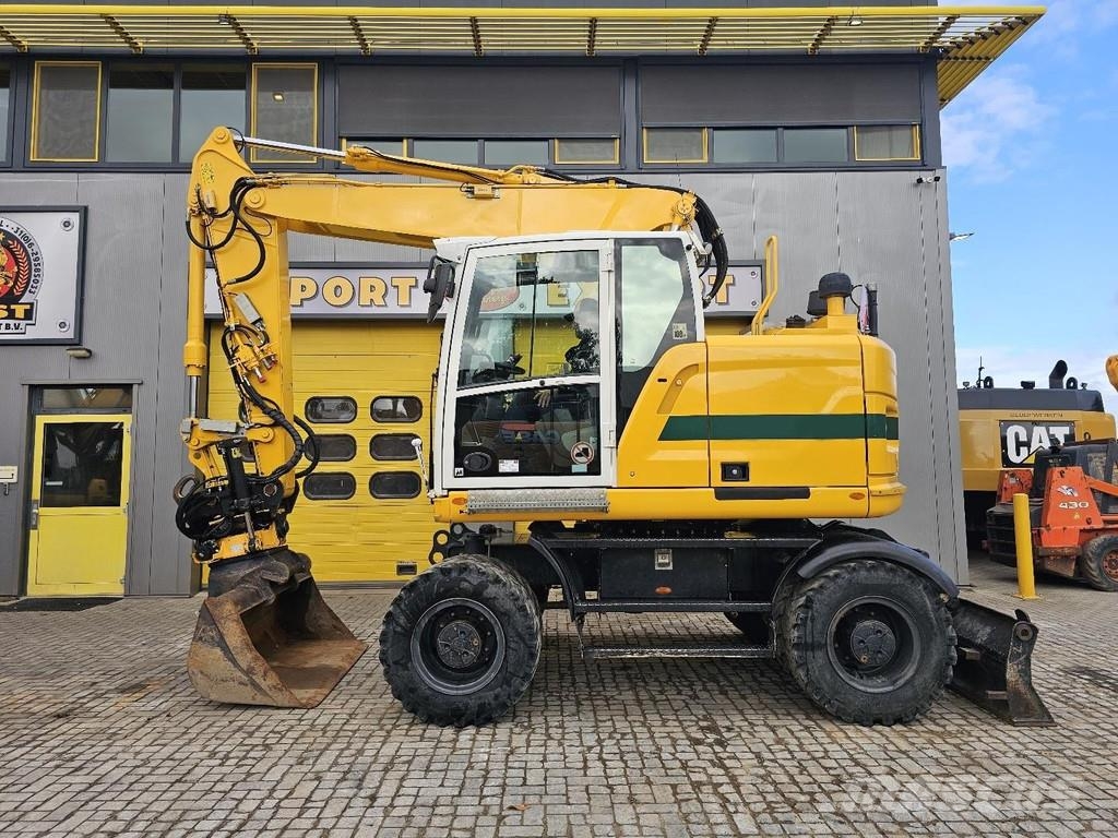CAT M315F حفارات بعجل