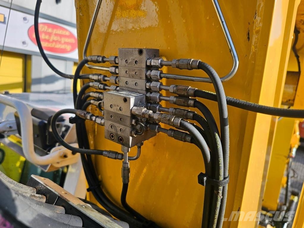 CAT M315F حفارات بعجل