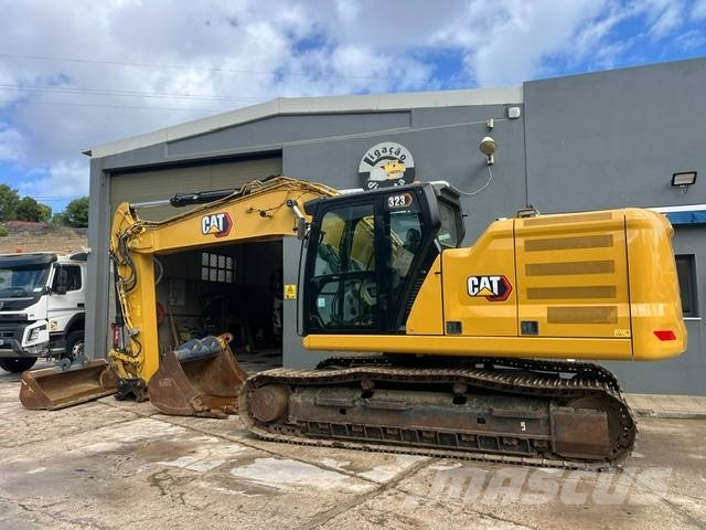 CAT 323 Rupsgraafmachines