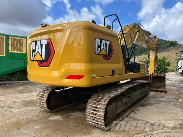 CAT 323 Rupsgraafmachines
