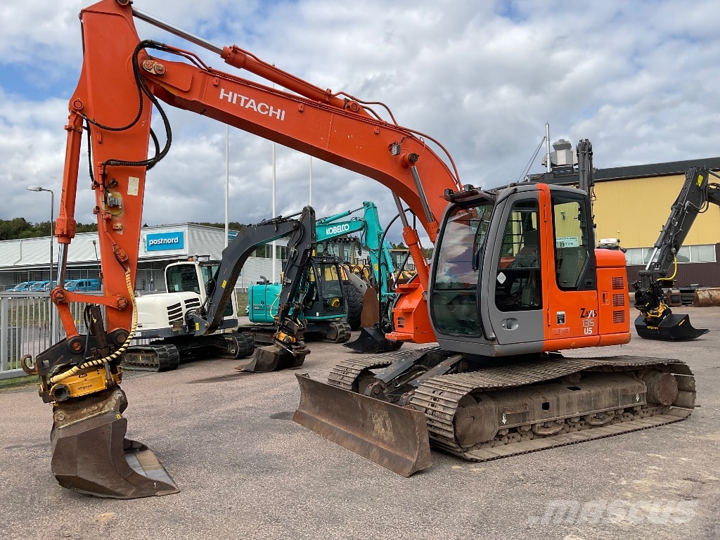 Hitachi ZX 135 US حفارات زحافة