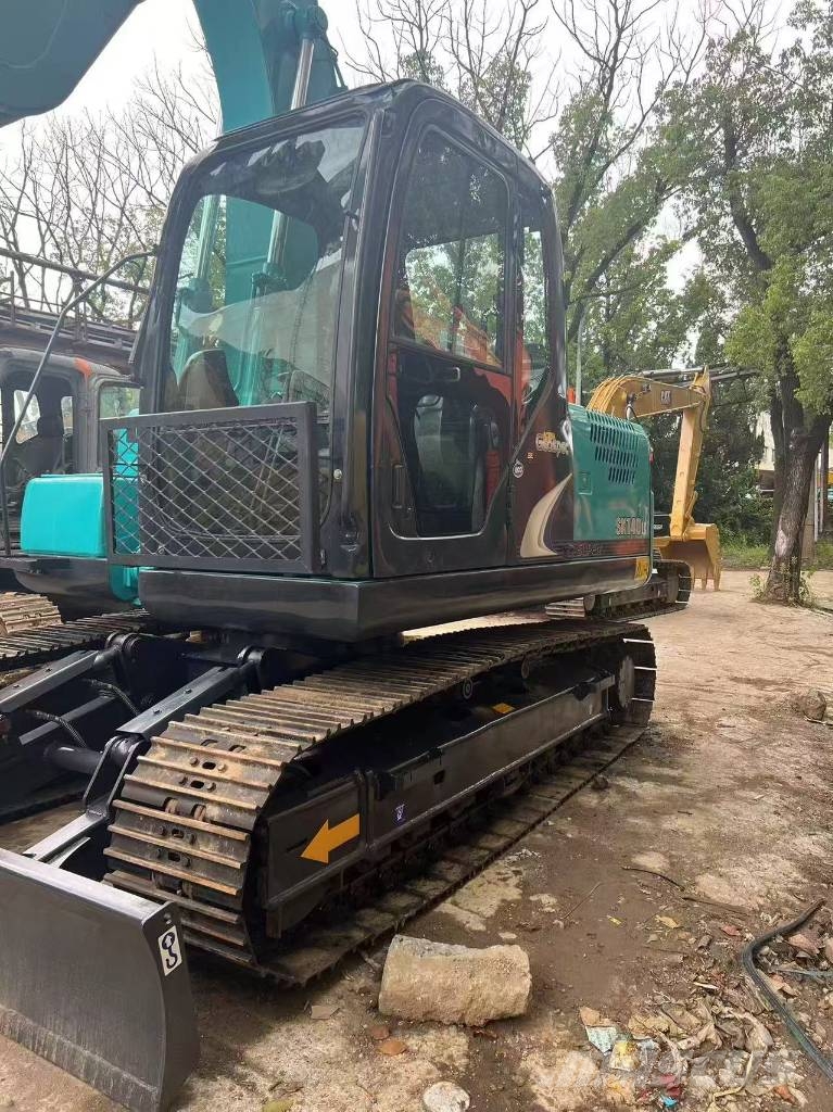 Kobelco SK 140 Beltegraver