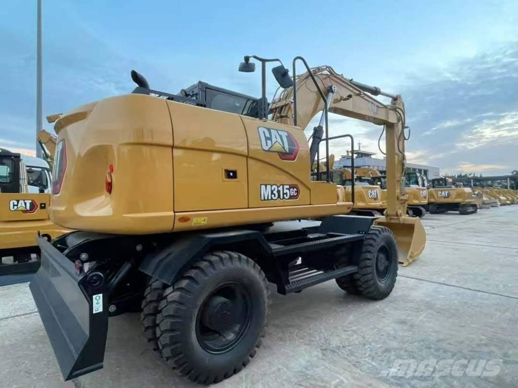 CAT M 315 حفارات بعجل
