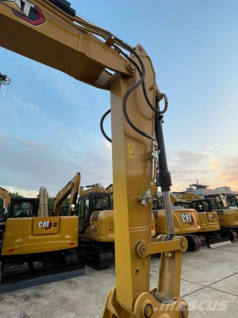 CAT M 315 حفارات بعجل