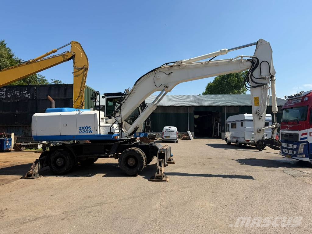 Hitachi ZX220 W-5 outriggers Pelle sur pneus