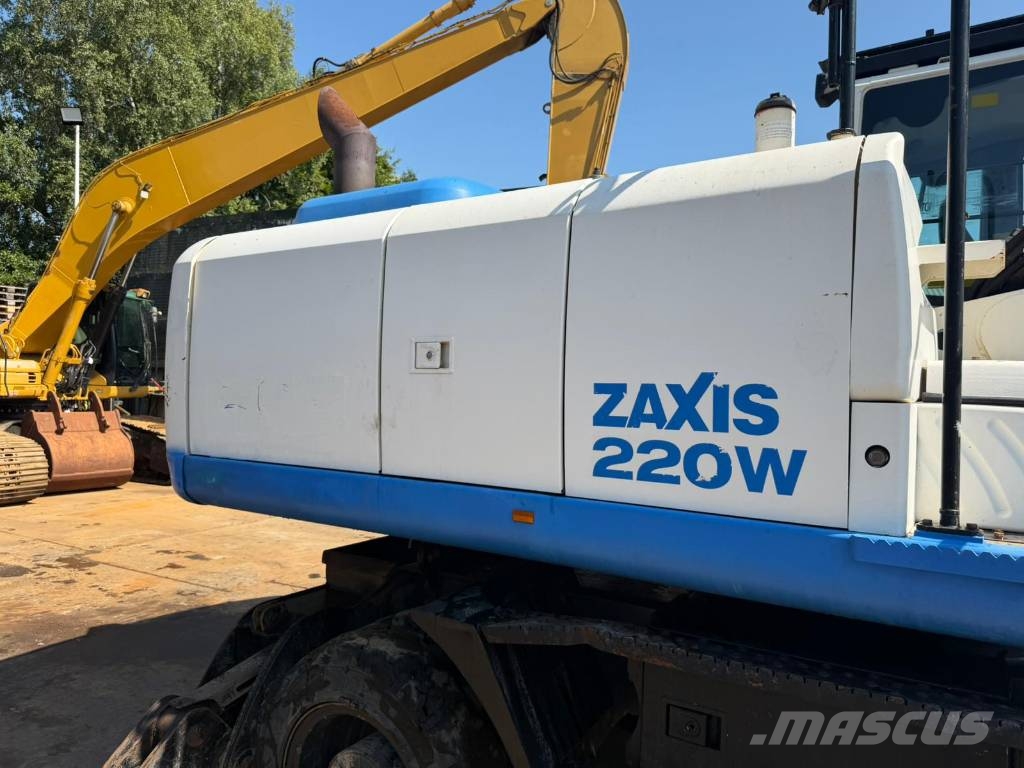 Hitachi ZX220 W-5 outriggers Pelle sur pneus