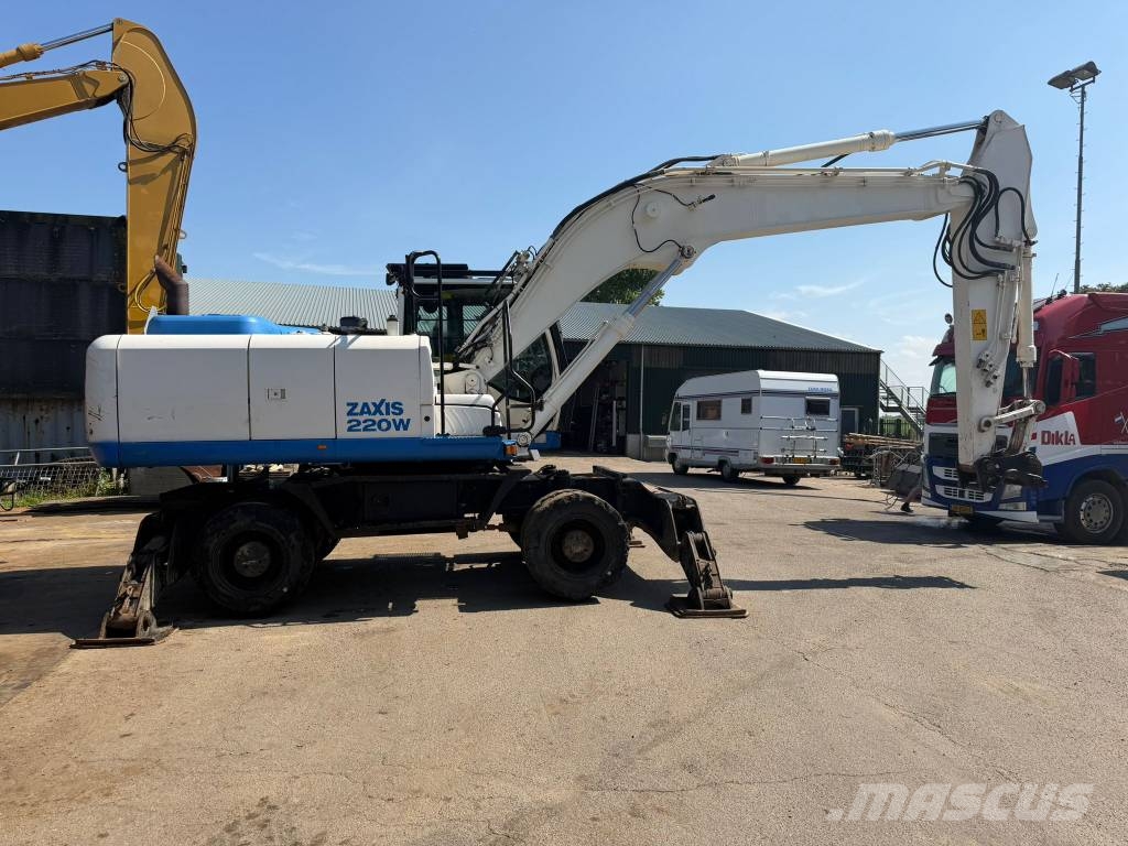 Hitachi ZX220 W-5 outriggers Pelle sur pneus