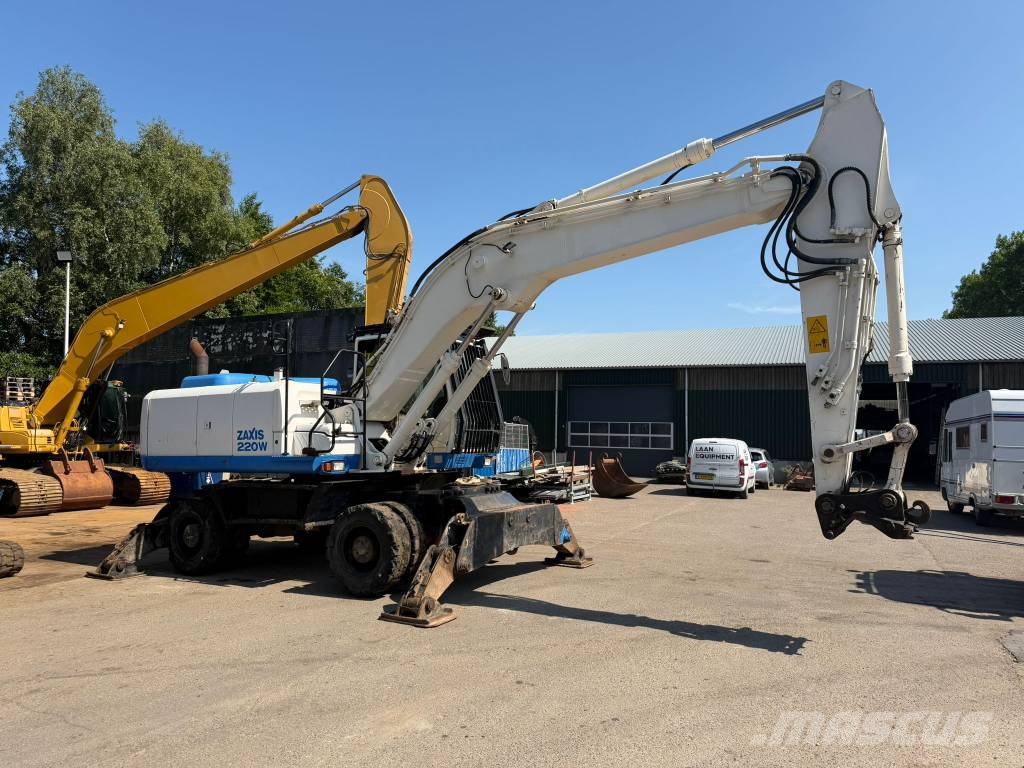 Hitachi ZX220 W-5 outriggers Pelle sur pneus