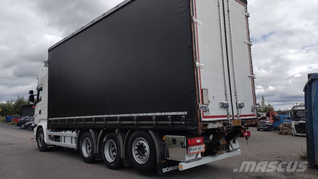 Scania R580 8x4 kapellilava Camiones de caja de lona
