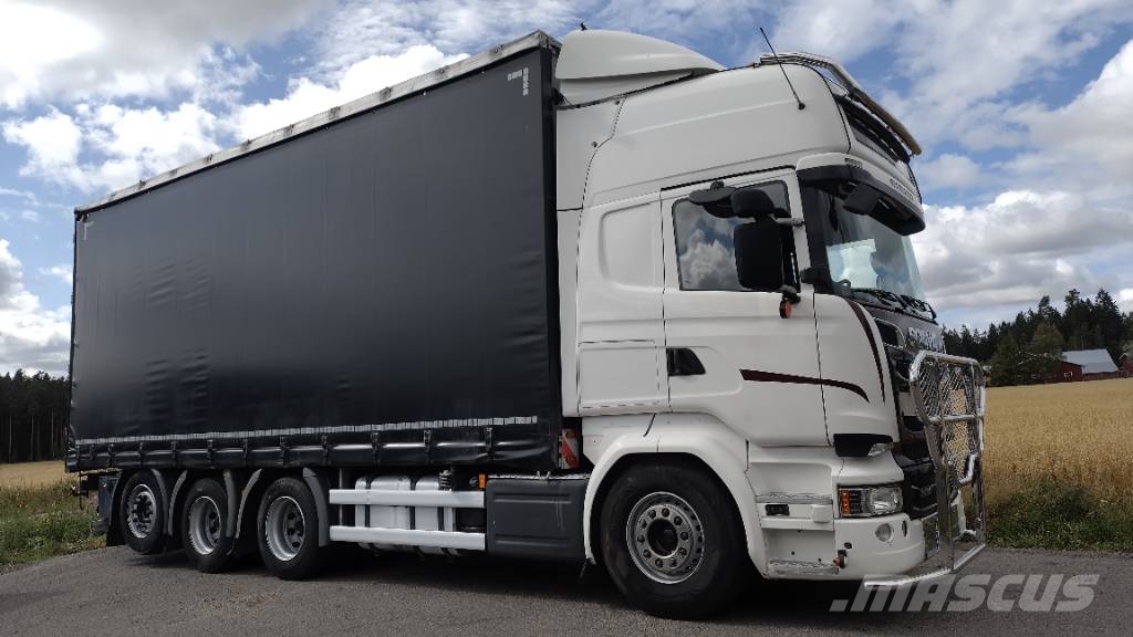 Scania R580 8x4 kapellilava Camiones de caja de lona