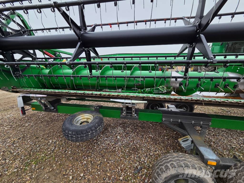 John Deere T 670 i Kombajni