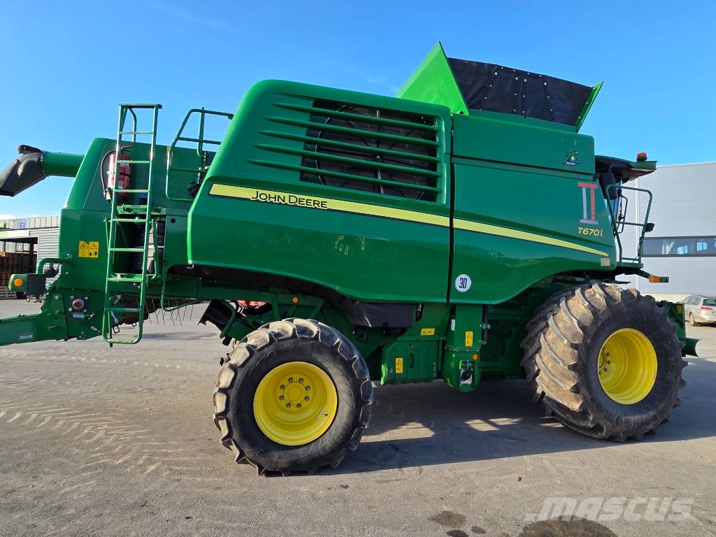 John Deere T 670 i Kombajni