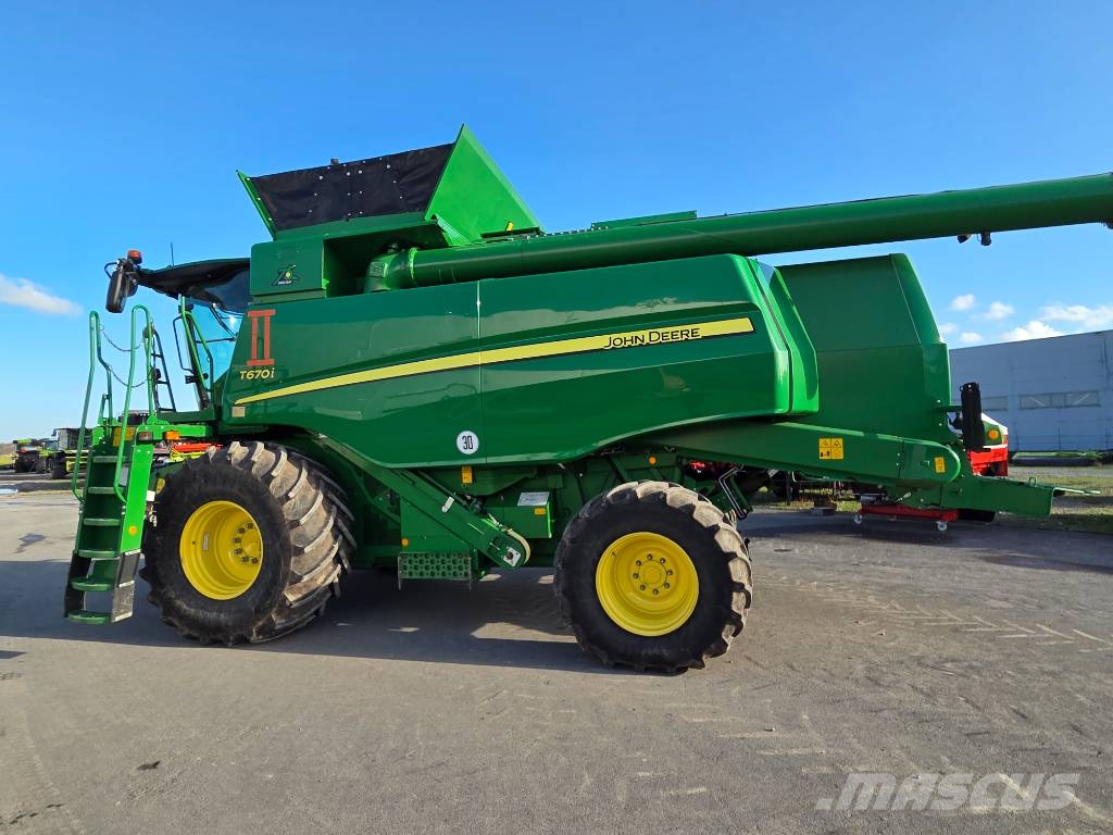John Deere T 670 i Kombajni