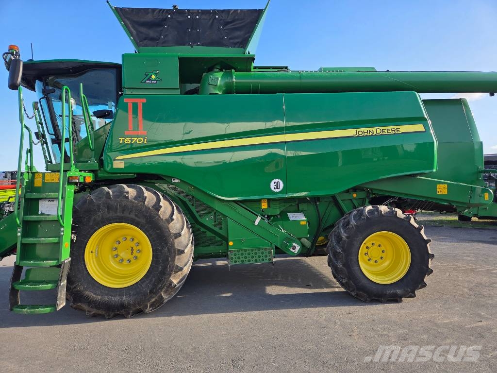 John Deere T 670 i Kombajni