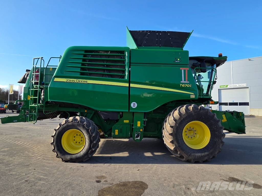 John Deere T 670 i Kombajni